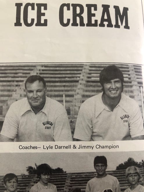 Coach Lyle Darnell and Jimmy Champion from the Glencoe 1973 state championship football team.