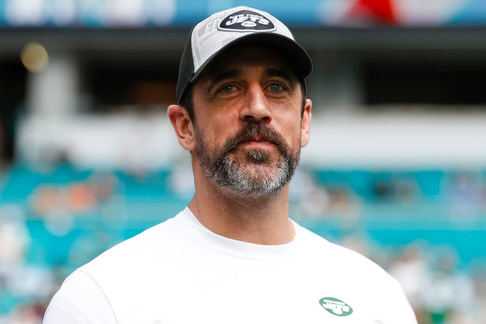 aaron rodgers looking up inside a football stadium