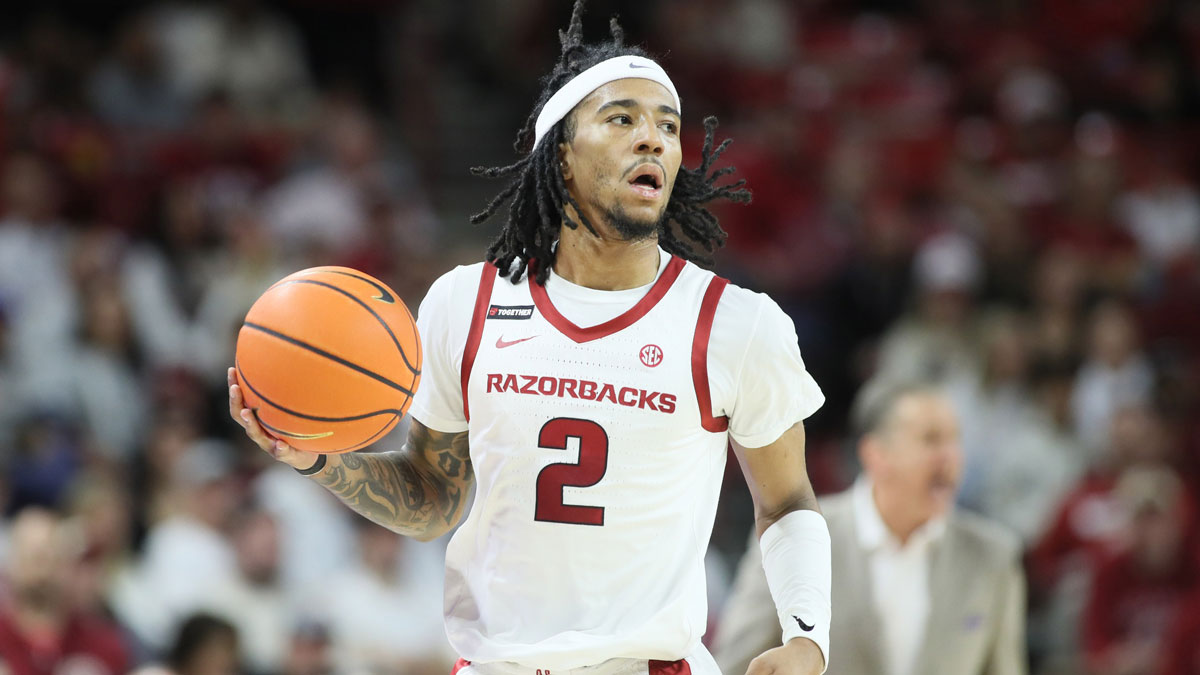 Arkansas Razorbacks guard Boogie Fland (2) dribbles during the first half against the Florida Gators at Bud Walton Arena.