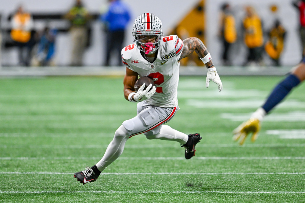 ATLANTA, GA - JANUARY 20: Wide Receiver Emeka Egbuka #2 of the Ohio State Buckeyes runs with the ball after a reception during the Ohio State Buckeyes versus Notre Dame Fighting Irish College Football Playoff National Championship game on January 20, 2025, at Mercedes-Benz Stadium in Atlanta, GA. (Photo by Rich von Biberstein/Icon Sportswire)