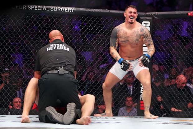 Tom Aspinall reacts to beating Sergei Pavlovich during UFC 295 at Madison Square Garden.