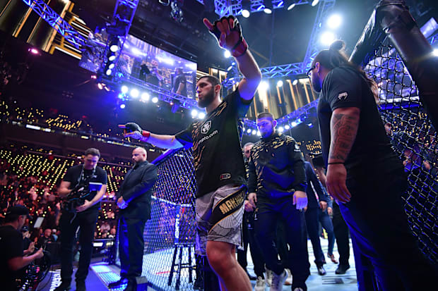 Islam Makhachev leaves the Octagon after defeating Renato Moicano during UFC 311 at Intuit Dome.