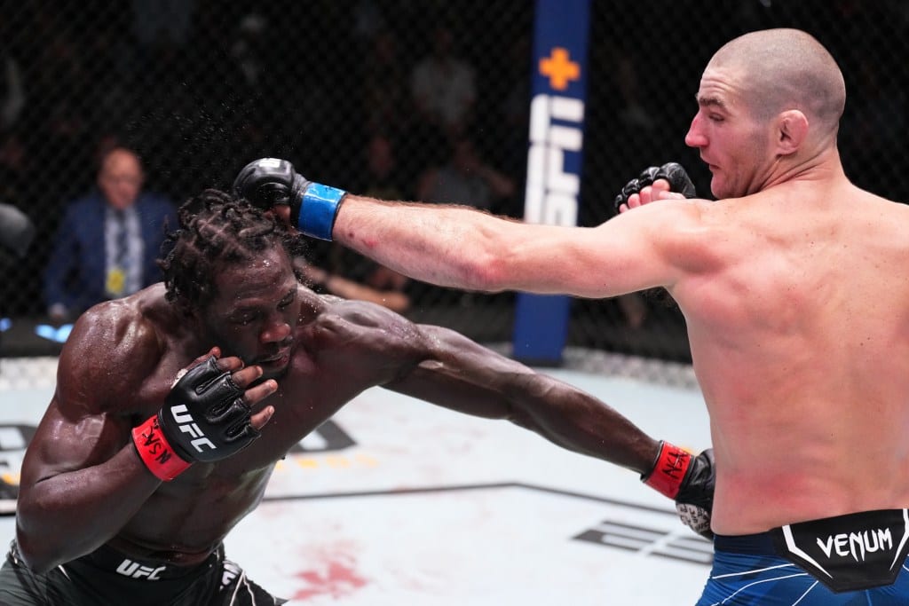 Sean Strickland punches Jared Cannonier during their UFC Fight Night main event in 2022.