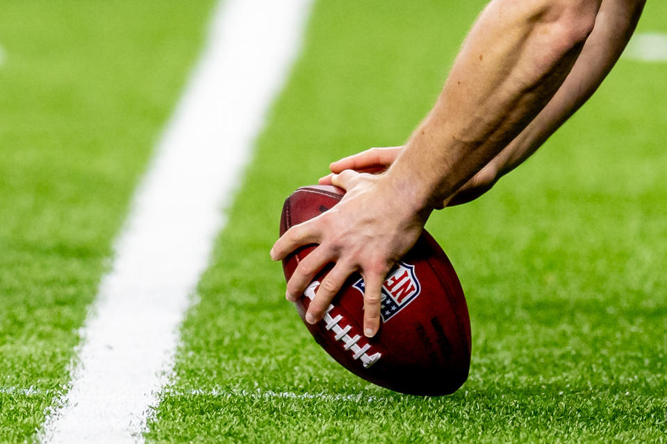 Dec 29, 2024; New Orleans, Louisiana, USA;  Detailed view of the NFL football being hiked during the second half of the game between the New Orleans Saints and the Las Vegas Raiders at Caesars Superdome. Mandatory Credit: Stephen Lew-Imagn Images