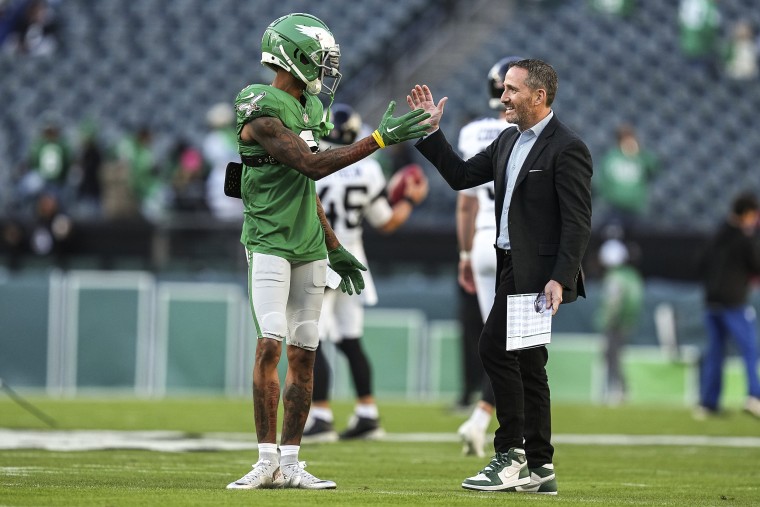 DeVonta Smith #6 of the Philadelphia Eagles and general manager Howie Roseman