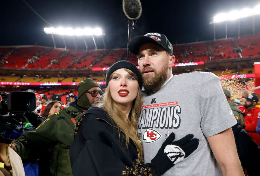 Taylor Swift celebrates with Travis Kelce #87 of the Kansas City Chiefs after defeating the Buffalo Bills 32-29 in the AFC Championship Game at GEHA Field at Arrowhead Stadium on January 26, 2025 in Kansas City, Missouri. (Photo by David Eulitt/Getty Images)