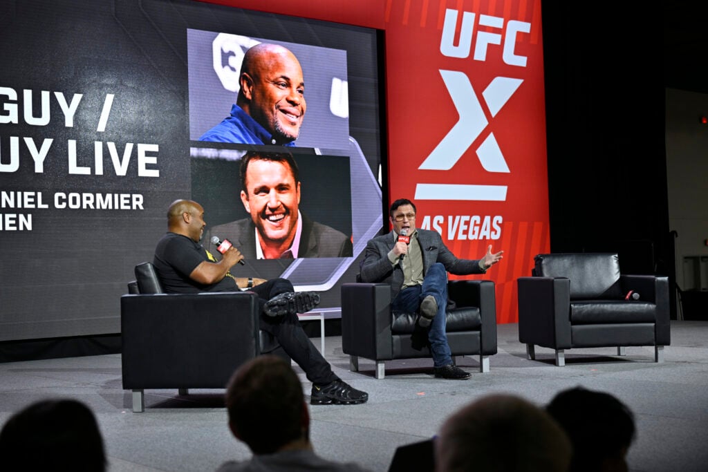 Daniel Cormier and Chael Sonnen host their show Good Guy / Bad Guy Live during day one of UFC X at the Las Vegas Convention Center on June 28, 2024...