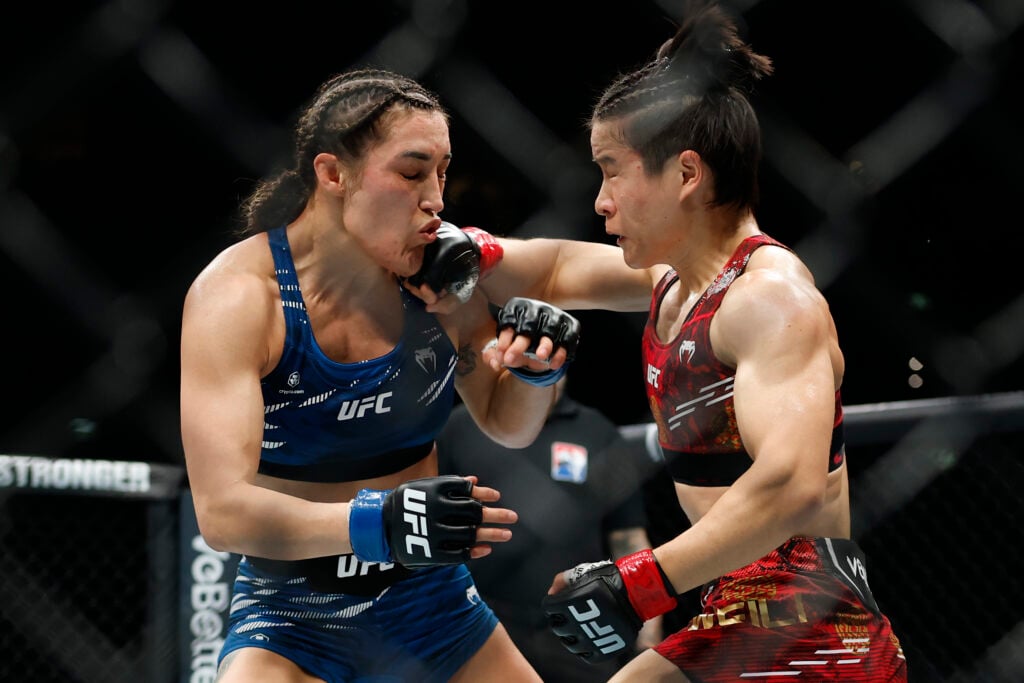 Tatiana Suarez of the United States of America fights Zhang Weili of China in their Strawweight Title Bout during UFC 312 at Qudos Bank Arena on Fe...